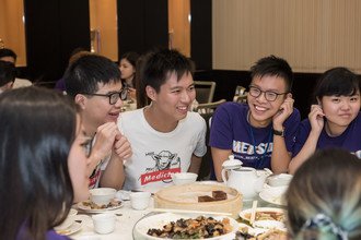 Students having a chit chat at Pre-O Camp dinner