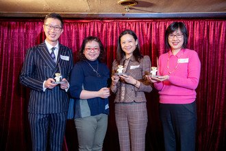 Dr Bonita Law presented souvenirs to lucky draw winners