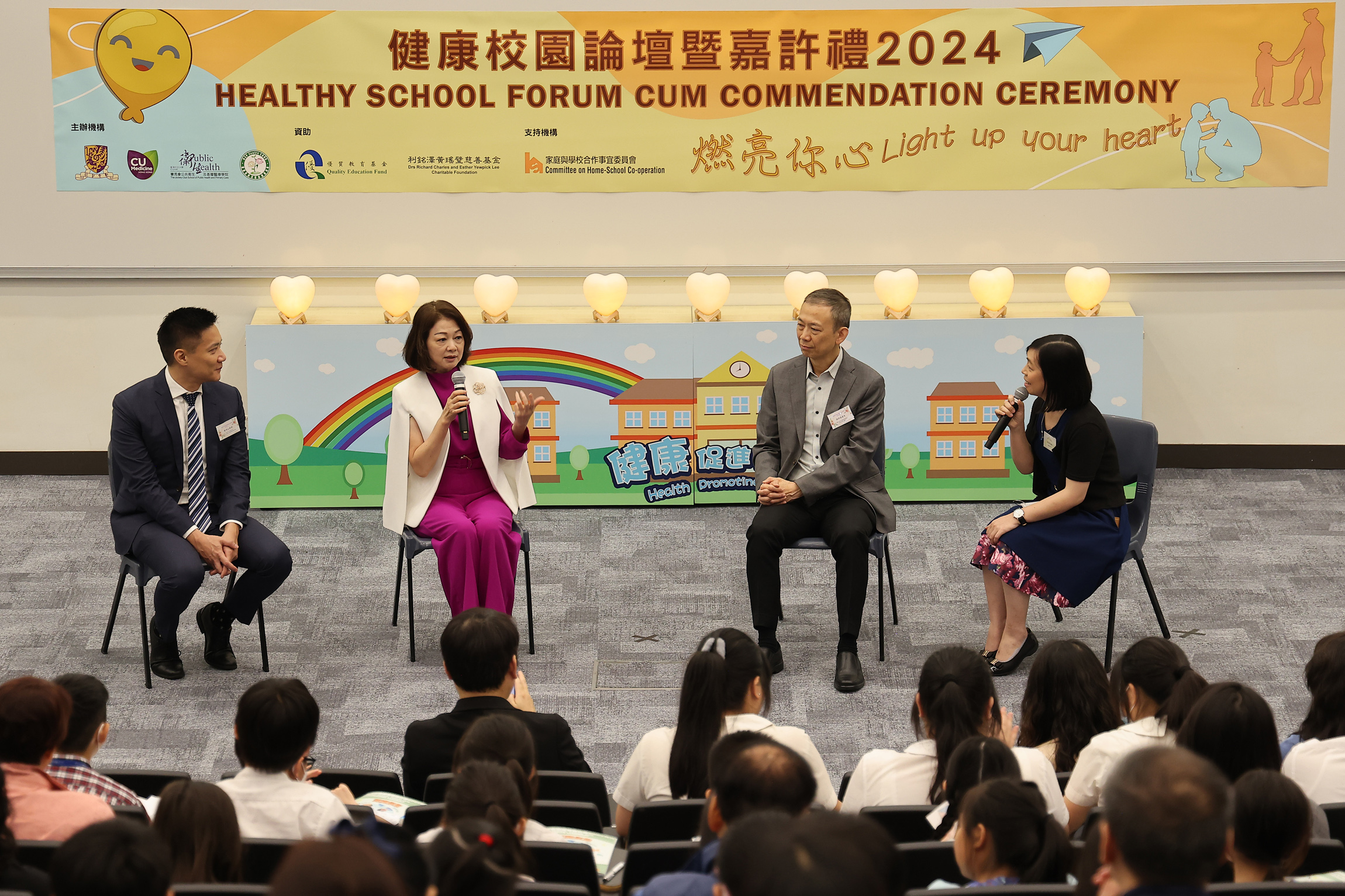 (From left) Professor Samuel Wong, Ms Scarlett Pong, and Dr Thomas Chung exchanged views on mental health issues of school children. The topics included common mental health problems and health promotion in schools.