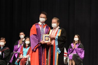 Prof. Francis CHAN, SBS, JP, Dean, Faculty of Medicine of CUHK, presents souvenir to Guest of Honour of Schools Session, Prof. Anthony T Y WU, GBS, JP,National Standing Committee Member of the Chinese People's Political Consultative Conference.