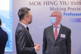 Prof. Patrick MAXWELL, Regius Professor of Physic and Head of School of Clinical Medicine, University of Cambridge (on the right) and Prof. Francis CHAN, Dean of Faculty of Medicine, CUHK (on the left) greeted at the reception area.