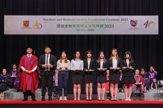 Group photo of student awardees of Schools session on stage