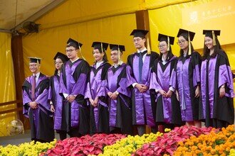 Graduates being blessed and congratulated by Faculty member