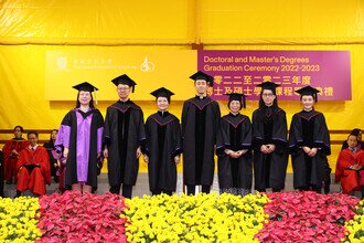 Graduates being blessed and congratulated by Faculty member