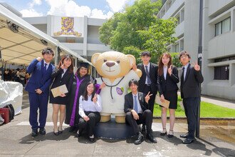 Group photo of procession members and students after the ceremony 