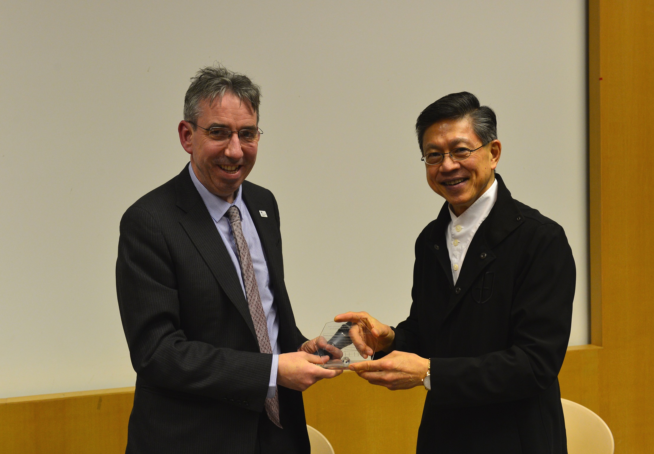 Prof. Eng-Kiong Yeoh (right), Director of the Jockey Club School of Public Health and Primary Care