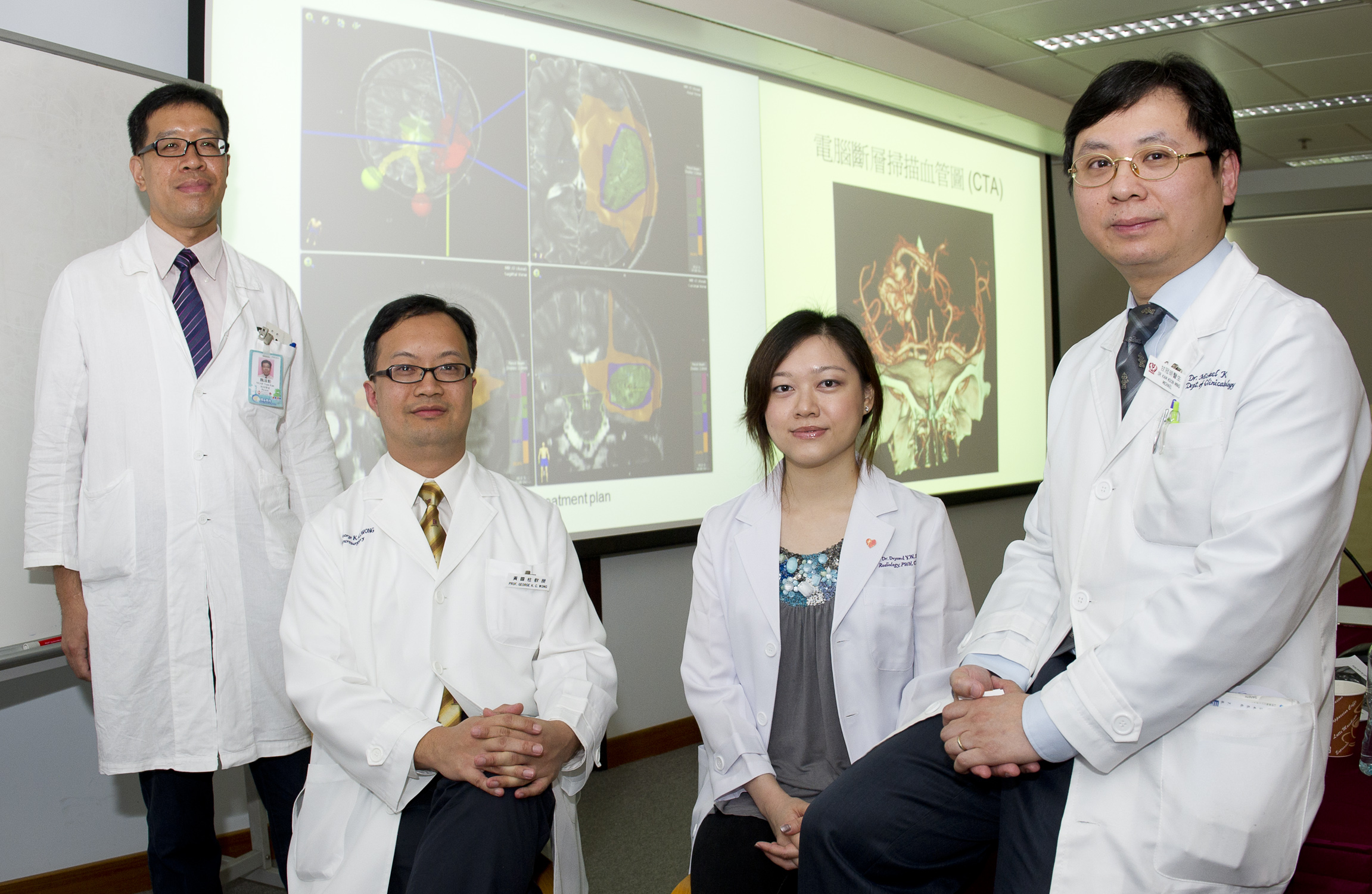 From Left: Mr Dennis Yuen Kan NGAR, Medical Physicist, Department of Clinical Oncology; Prof George Kwok Chu WONG, Professor, Division of Neurosurgery, Department of Surgery; Dr Deyond Yung Woon SIU, Clinical Assistant Professor (honorary), Department of Imaging and Interventional Radiology and Dr Michael Koon Ming KAM, Clinical Associate Professor (honorary), Department of Clinical Oncology