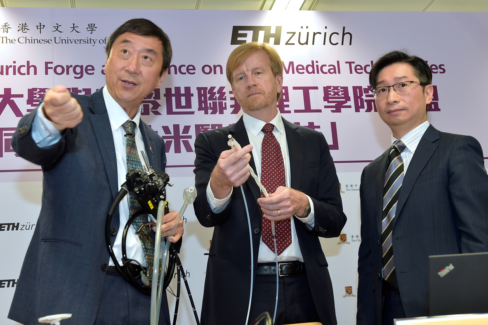 Prof. Joseph SUNG (Left) points out that the conventional endoscopes are not flexible enough to travel along the small bowel intestine, while the new magnetic guided endoscope is slimmer and more elastic. The magnetic driven device can conduct more precise check-up, save half of the procedural time and reduce discomfort caused to patients.