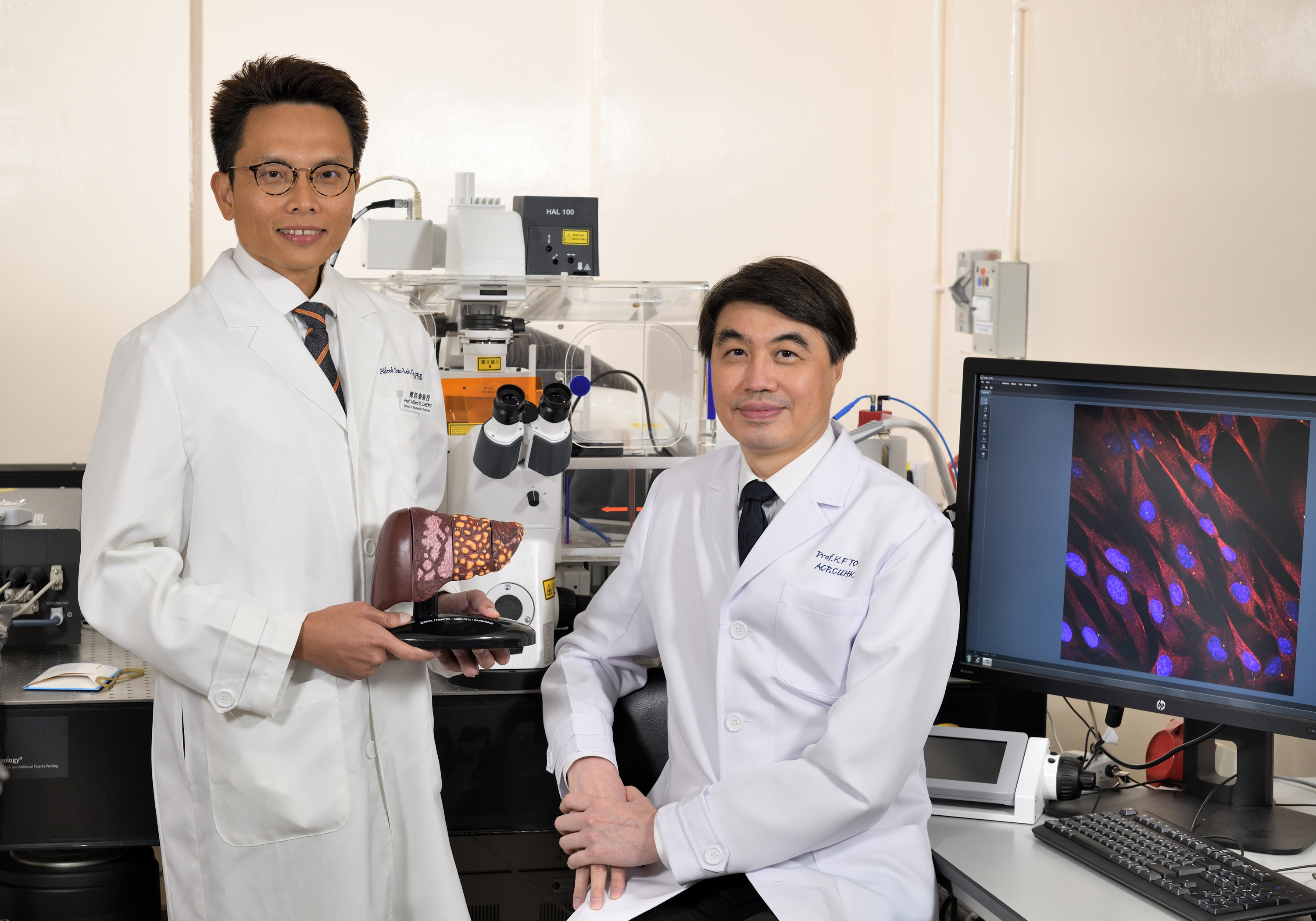 Prof. Alfred Cheng (left) and Prof. Ka Fai TO