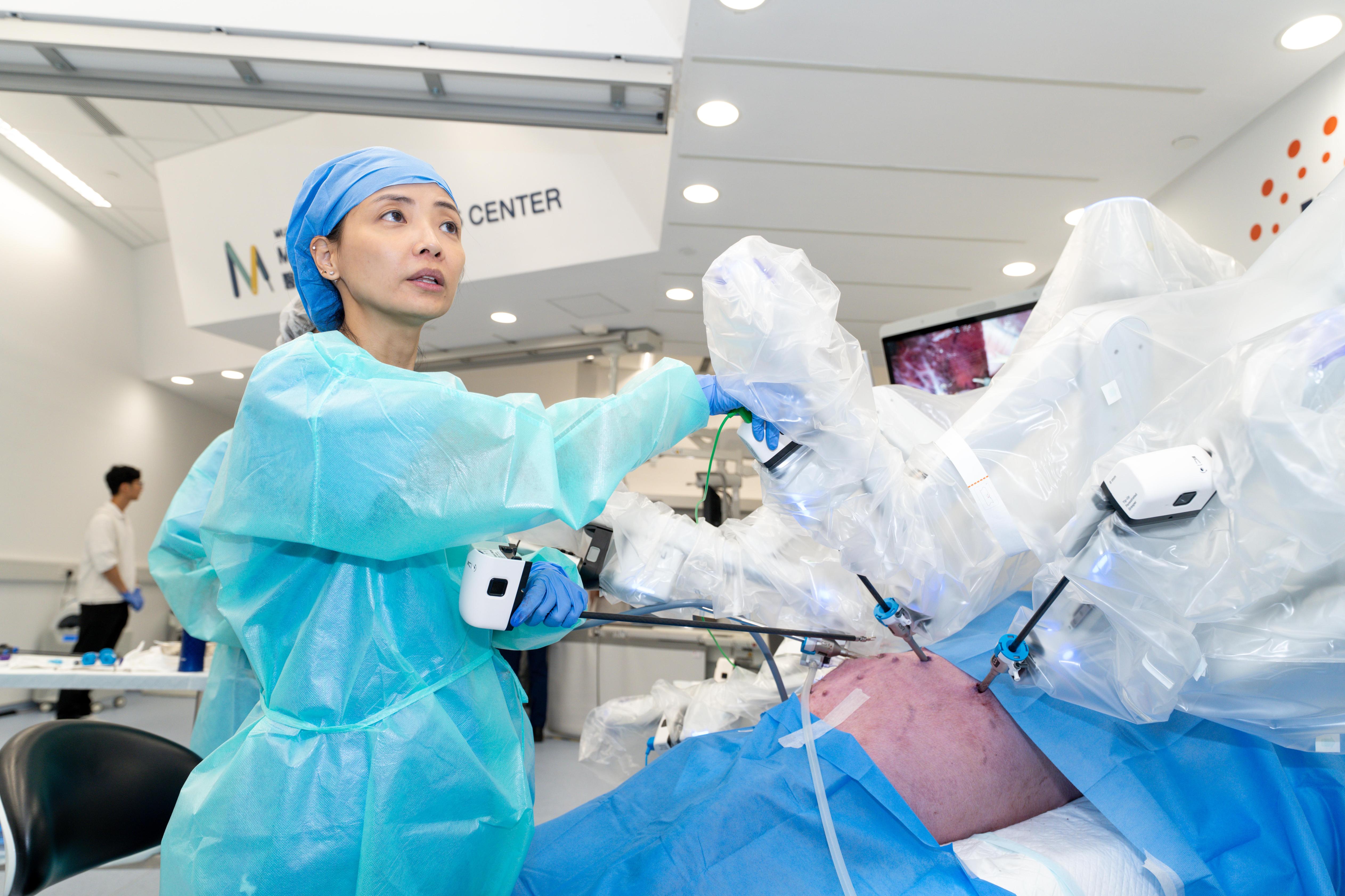 Featured are Dr Chan in Hong Kong, assisted by two CUHK medical students