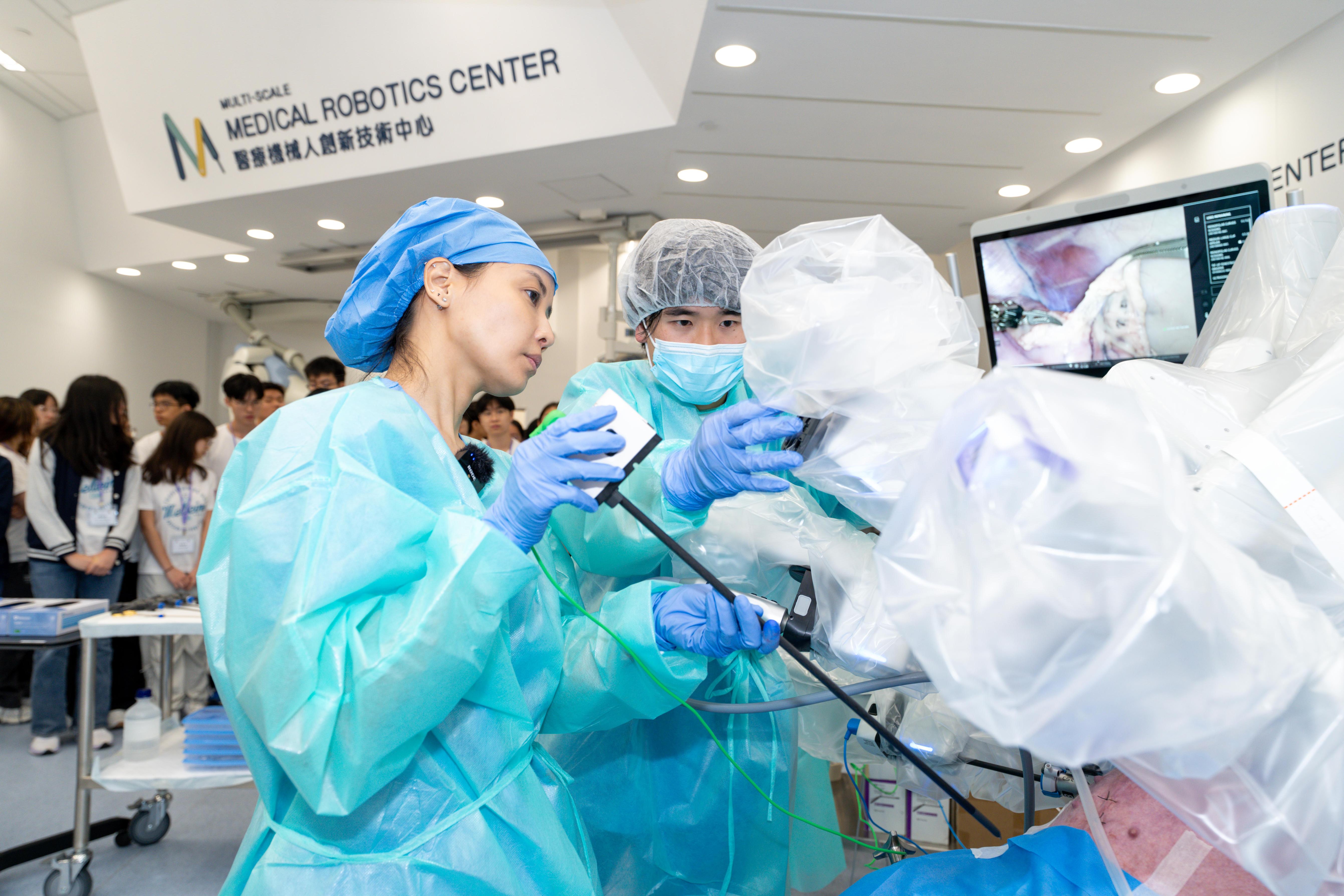 Featured are Dr Chan in Hong Kong, assisted by two CUHK medical students