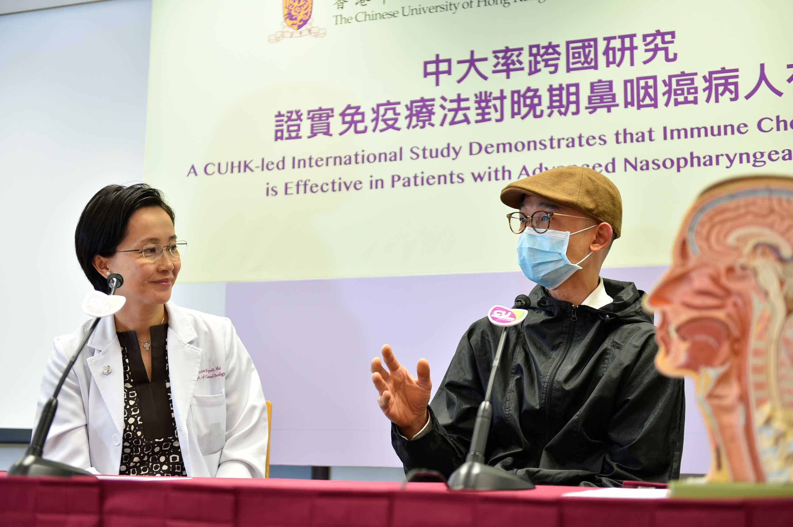 Mr CHAN (pseudo name, right), an NPC patient, states that his physical condition and life quality were not seriously affected during immunotherapy, and there were fewer side effects than chemotherapy